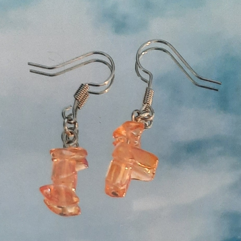 Orange tinted gem like earrings